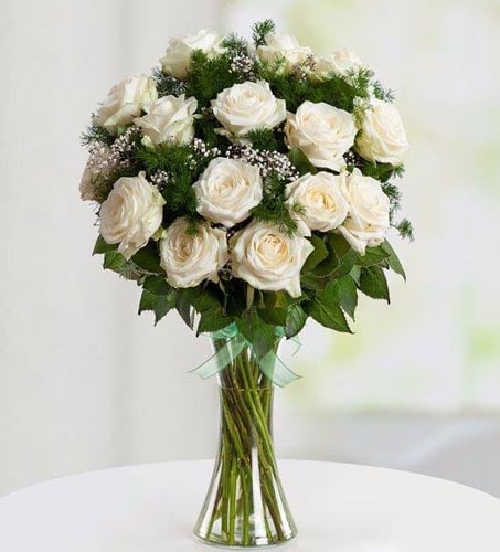 White Roses includes the vase